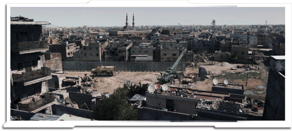 This was the one matte painting I did for ‘American Sniper’ at the very end of the show, along with Laurie Kindiak. The base render was the same city model created for the aerial shots, and the MRAP and wall were rendered by the lighting department.